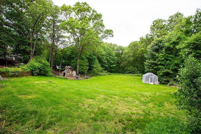 166 Fairview Ave, Rehoboth, MA 02769 - view of green lawn with an exterior structure and an outdoor structure