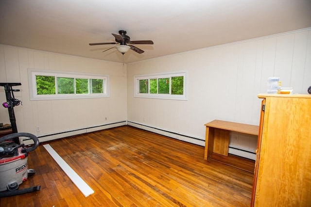 166 Fairview Ave, Rehoboth, MA 02769 - workout area featuring hardwood / wood-style flooring, healthy amount of natural light, a ceiling fan, baseboard heating, and ornamental molding