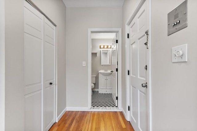 16 Foster St Unit 5, Boston, MA 02109 - hall with baseboards and light wood-style floors