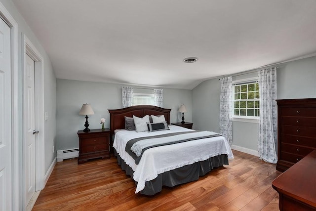 7 Perkins Row, Topsfield, MA 01983 - bedroom with a baseboard radiator and wood finished floors