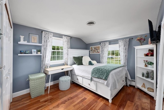 7 Perkins Row, Topsfield, MA 01983 - bedroom with lofted ceiling, multiple windows, wood finished floors, and baseboard heating