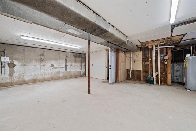 unfinished basement with water heater