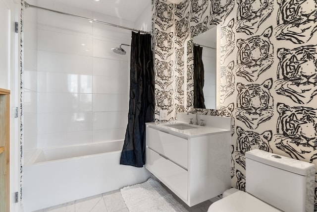 full bathroom featuring vanity, toilet, and shower / bath combination with curtain