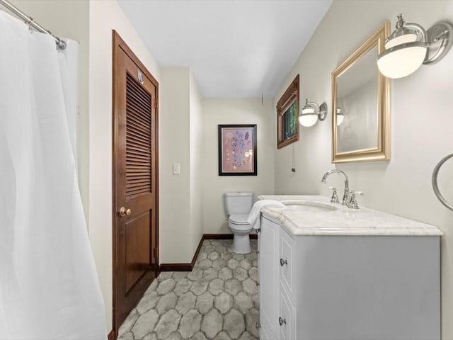 91 Lake Shore Dr, West Brookfield, MA 01585 - full bath featuring toilet, vanity, and baseboards
