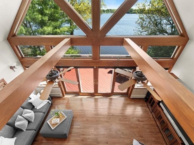 91 Lake Shore Dr, West Brookfield, MA 01585 - living area featuring wood-type flooring, a water view, and a ceiling fan