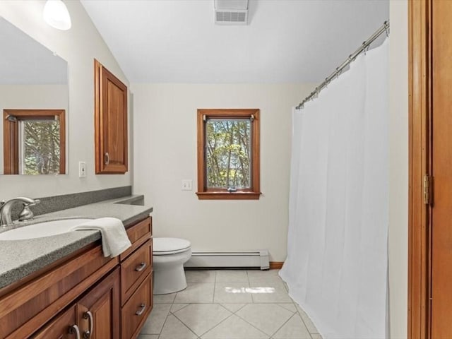 91 Lake Shore Dr, West Brookfield, MA 01585 - bathroom featuring baseboard heating, plenty of natural light, toilet, vanity, and lofted ceiling