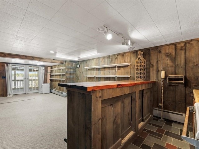 91 Lake Shore Dr, West Brookfield, MA 01585 - indoor dry bar featuring a baseboard radiator, wooden walls, and rail lighting