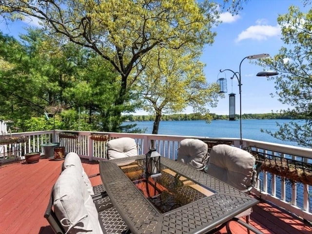 91 Lake Shore Dr, West Brookfield, MA 01585 - wooden terrace featuring outdoor dining area and a water view