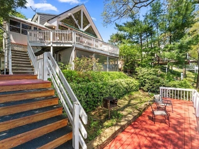 91 Lake Shore Dr, West Brookfield, MA 01585 - view of patio with stairs, a deck, and a sunroom