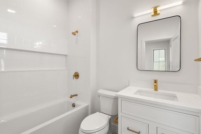 full bathroom featuring vanity, toilet, and tiled shower / bath