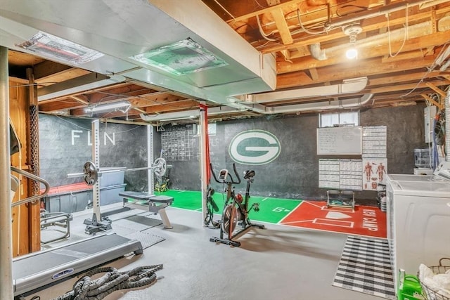 workout room featuring washer / dryer