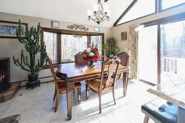 dining room featuring a baseboard radiator, lofted ceiling, and a notable chandelier