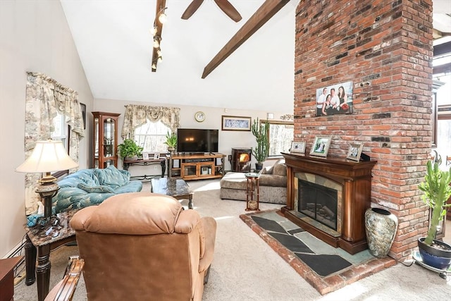 living room featuring ceiling fan, beam ceiling, carpet floors, and high vaulted ceiling