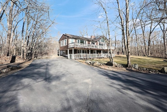 view of front property with a garage and a deck