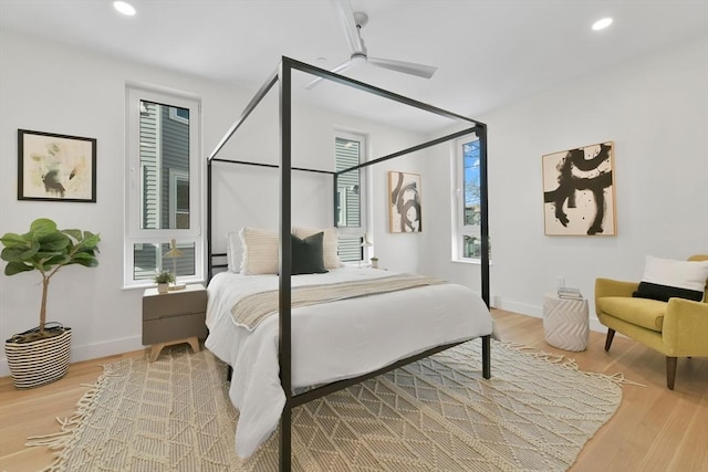 bedroom featuring ceiling fan and light wood-type flooring