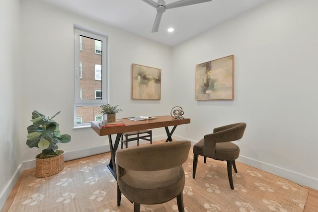 office area featuring ceiling fan and light wood-type flooring