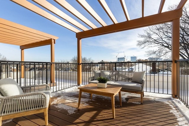 wooden deck featuring a pergola