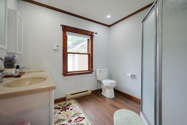 5 Tucker Park, Pepperell, MA 01463 - full bath featuring baseboard heating, crown molding, wood finished floors, double vanity, and a stall shower