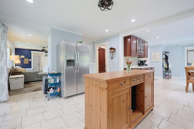5 Tucker Park, Pepperell, MA 01463 - kitchen featuring stainless steel fridge, butcher block countertops, recessed lighting, glass insert cabinets, and backsplash