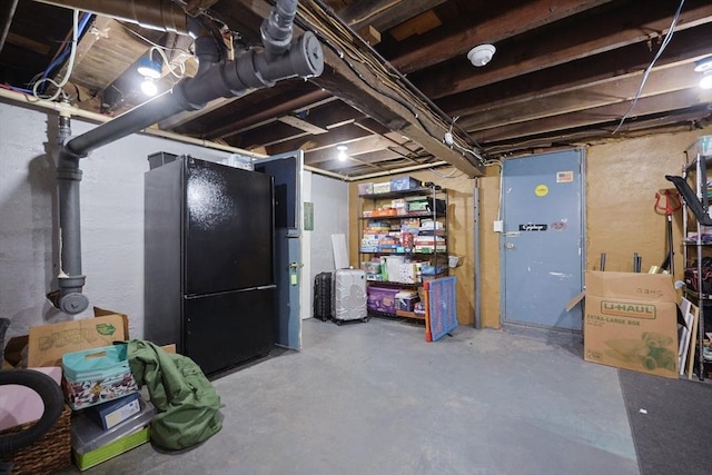 5 Tucker Park, Pepperell, MA 01463 - unfinished below grade area featuring freestanding refrigerator