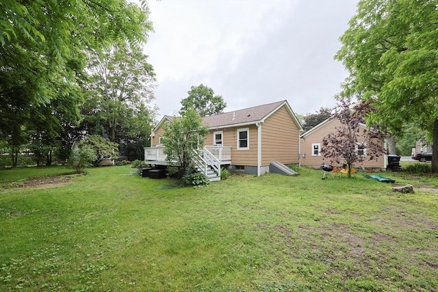 5 Tucker Park, Pepperell, MA 01463 - back of house with a wooden deck and a lawn