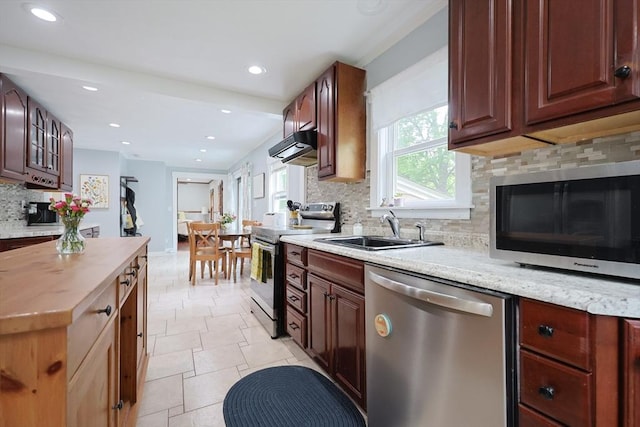 5 Tucker Park, Pepperell, MA 01463 - kitchen with stainless steel appliances, decorative backsplash, stone tile floors, under cabinet range hood, and recessed lighting
