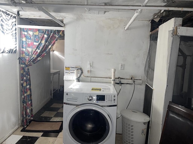 washroom with laundry area, washer / clothes dryer, and tile patterned floors