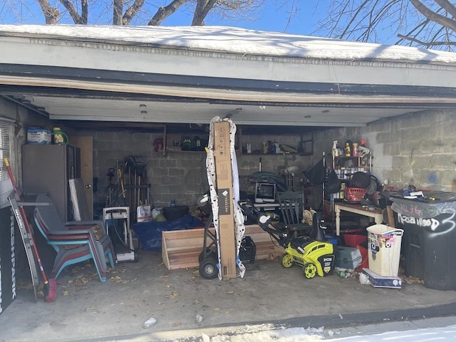 garage with freestanding refrigerator