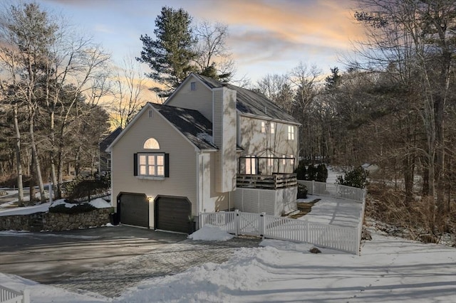 exterior space with a garage