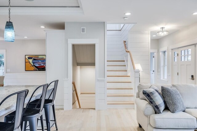 24 Valley Rd, Yarmouth, MA 02673 - living room with light wood-style floors, visible vents, stairway, and recessed lighting
