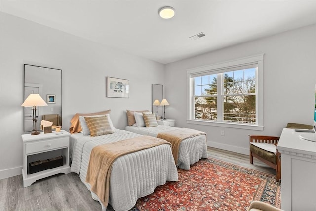 bedroom featuring light hardwood / wood-style flooring