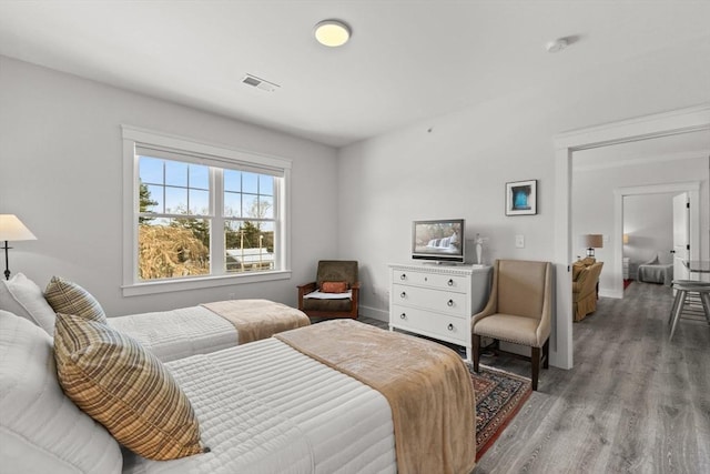 bedroom with light hardwood / wood-style floors