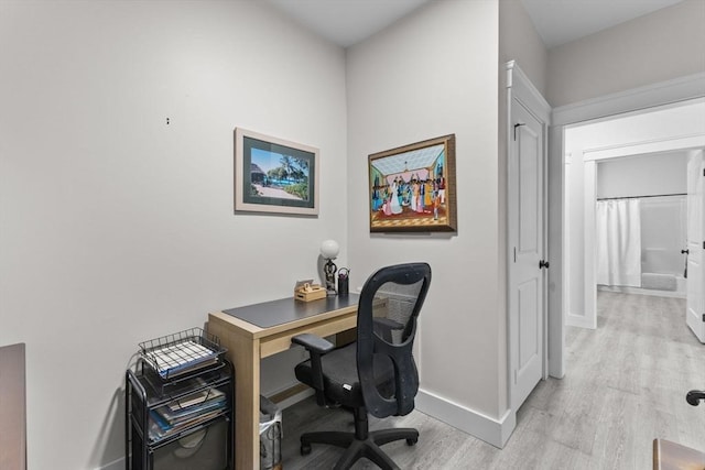 home office featuring light hardwood / wood-style flooring