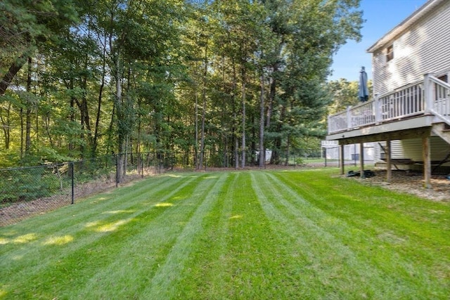 view of yard with a deck