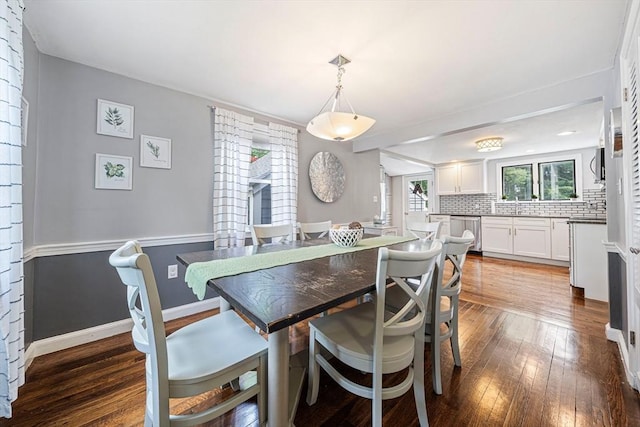 864 Front St, Weymouth, MA 02190 - dining area featuring dark wood-type flooring