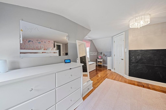 864 Front St, Weymouth, MA 02190 - bedroom with lofted ceiling and light wood-style flooring