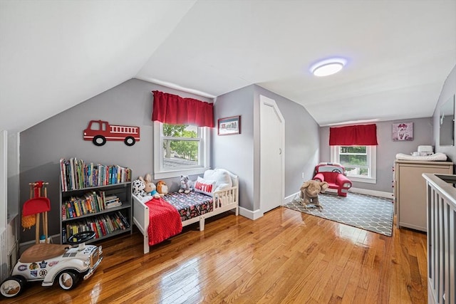 864 Front St, Weymouth, MA 02190 - bedroom with lofted ceiling, hardwood / wood-style floors, and baseboards
