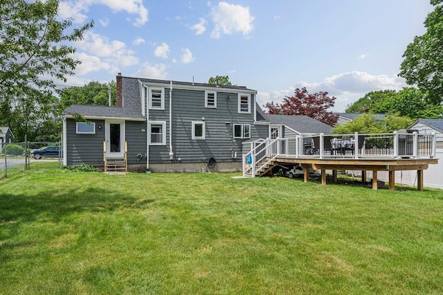 864 Front St, Weymouth, MA 02190 - back of house featuring entry steps, a wooden deck, and a chimney