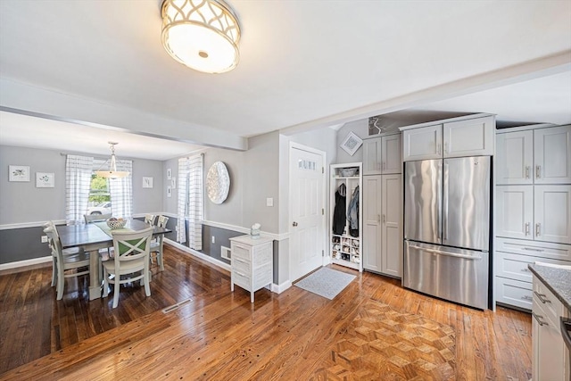 864 Front St, Weymouth, MA 02190 - dining space featuring baseboards and light wood-style floors