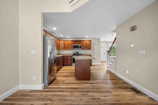 kitchen featuring recessed lighting, baseboards, visible vents, and stainless steel appliances