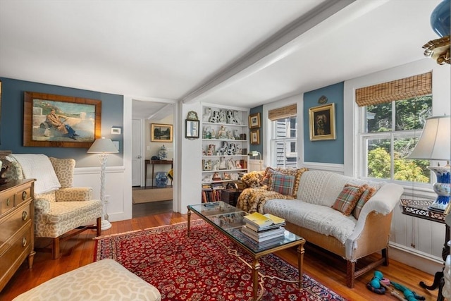 163/165 Highland St, Dedham, MA 02026 - living area featuring wood finished floors and wainscoting