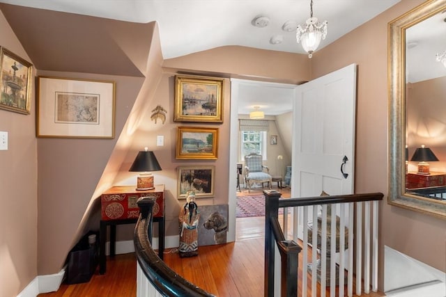163/165 Highland St, Dedham, MA 02026 - home office featuring wood finished floors, lofted ceiling, and a chandelier