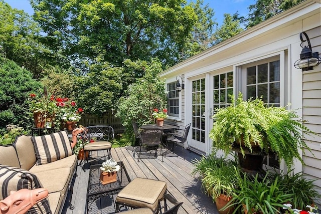 163/165 Highland St, Dedham, MA 02026 - wooden terrace featuring outdoor dining area, an outdoor living space, and french doors