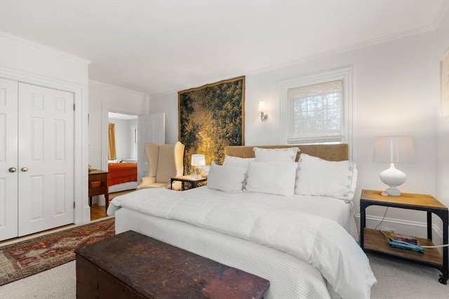 163/165 Highland St, Dedham, MA 02026 - carpeted bedroom featuring ornamental molding and a closet