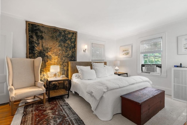 163/165 Highland St, Dedham, MA 02026 - bedroom with cooling unit, ornamental molding, and wood finished floors