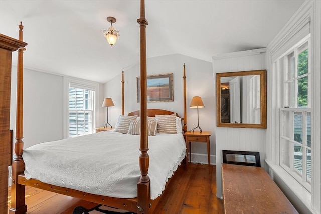 163/165 Highland St, Dedham, MA 02026 - bedroom featuring wood finished floors and vaulted ceiling