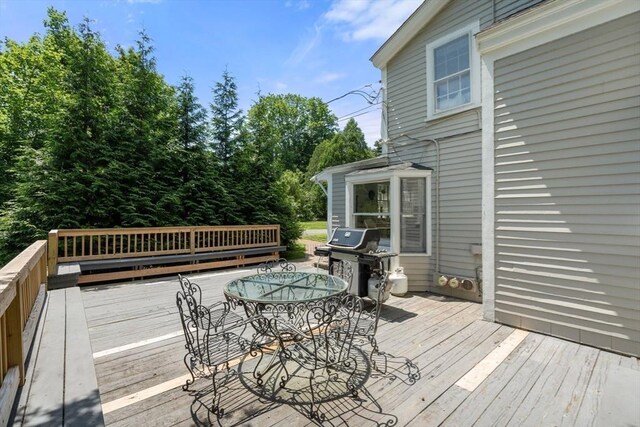 163/165 Highland St, Dedham, MA 02026 - deck with a grill and outdoor dining area