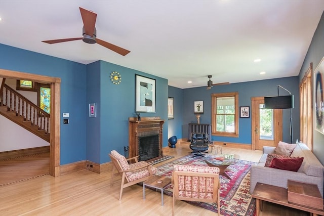 75 Lyman Rd, Northampton, MA 01060 - living room with ceiling fan, wood finished floors, stairway, recessed lighting, and a fireplace with flush hearth
