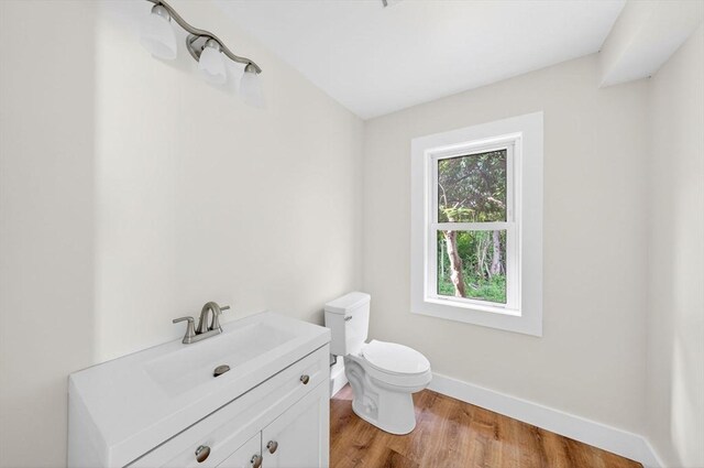 51 Ryder St, Dartmouth, MA 02747 - half bathroom with vanity and wood finished floors