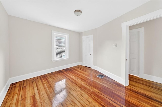 51 Ryder St, Dartmouth, MA 02747 - unfurnished bedroom featuring light wood-type flooring and a closet